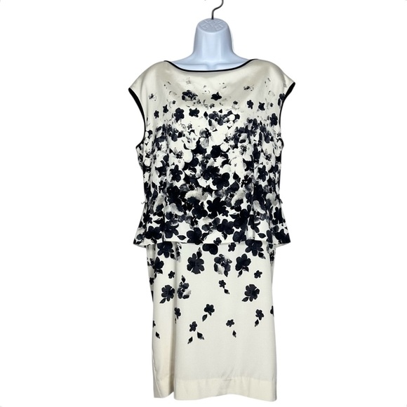 black and cream peplum dress Black Sleeveless Peplum Top With Cream Embroidery Details Small